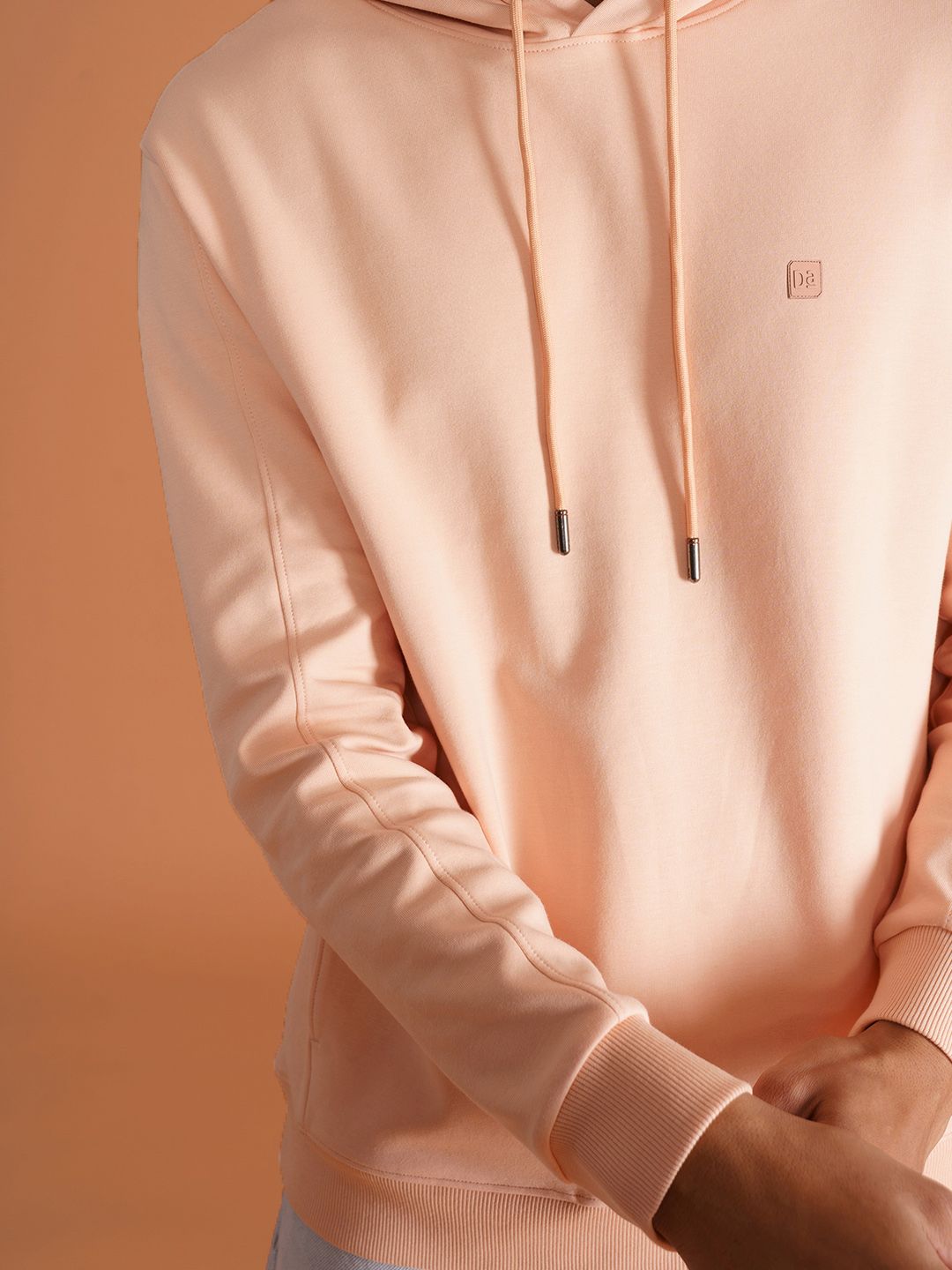  DAMENSCH Men Solid Peach Cotton Regular Fit Hoodie