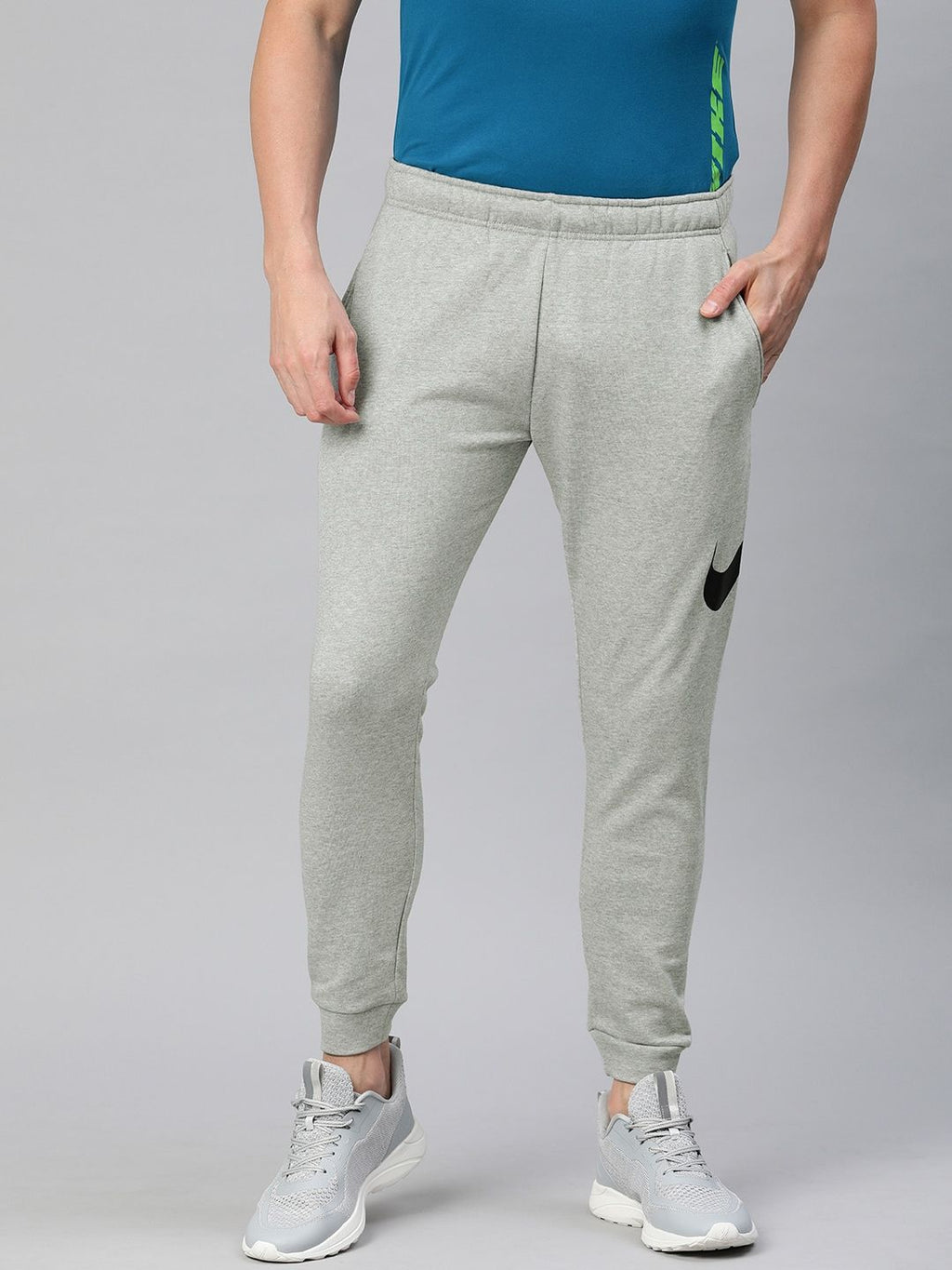  Nike Men Grey Solid Dri-FIT M NK Tapered Fit Training Joggers With Printed Detailing