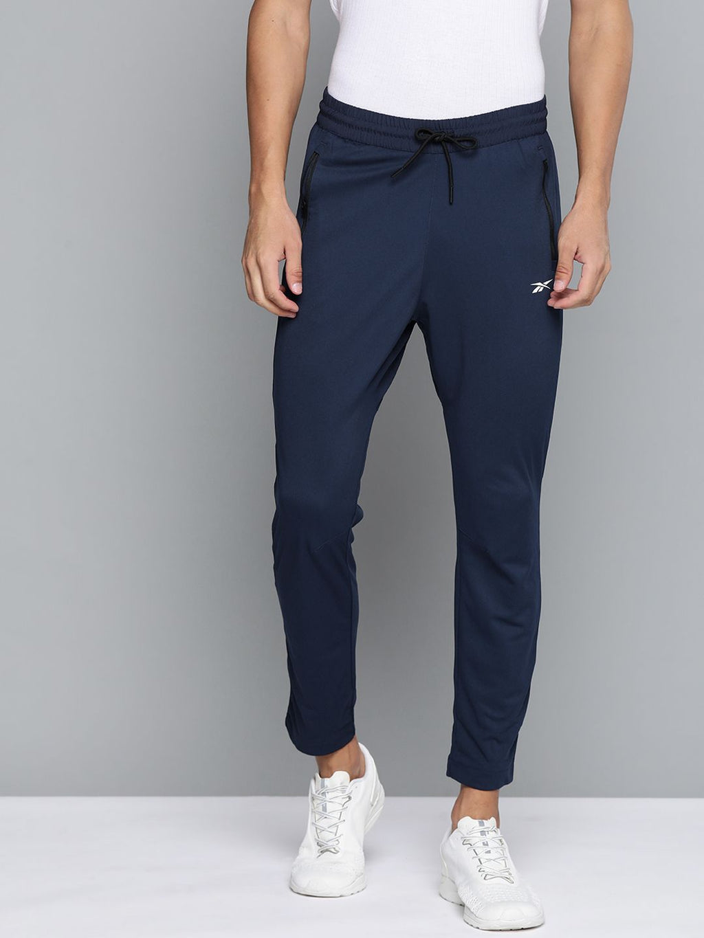  Reebok Men Navy Blue Solid Training WOR Knit Track Pants