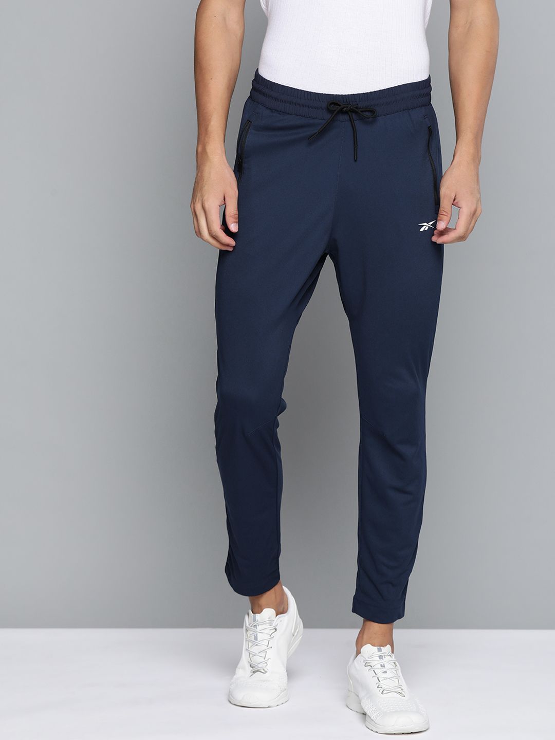  Reebok Men Navy Blue Solid Training WOR Knit Track Pants