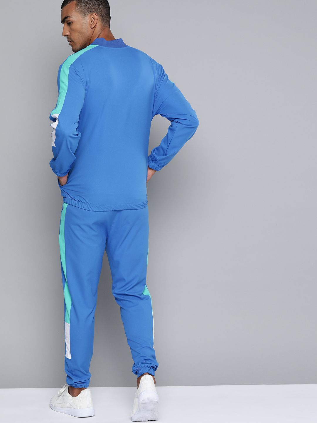 HRX By Hrithik Roshan Men Strong Blue Colourblock Regular Fit Rapid-Dry Lifestyle Tracksuits