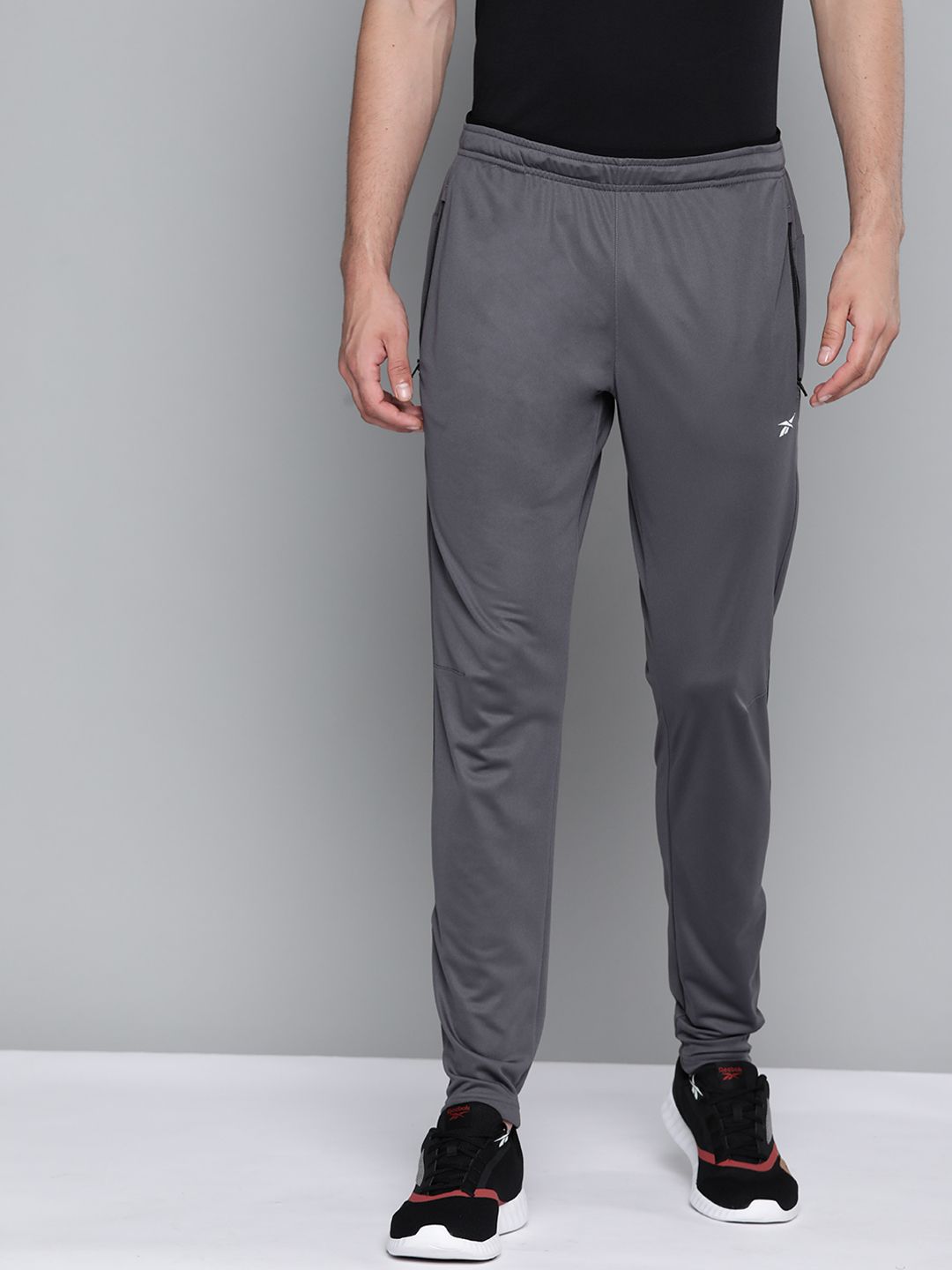  Reebok Men Charcoal Grey Solid Training Track Pants