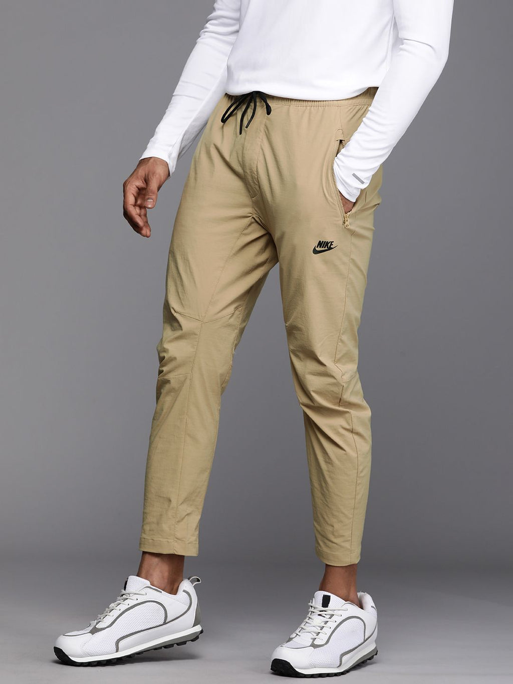  Nike Men Sportswear Solid Regular Fit Track Pants