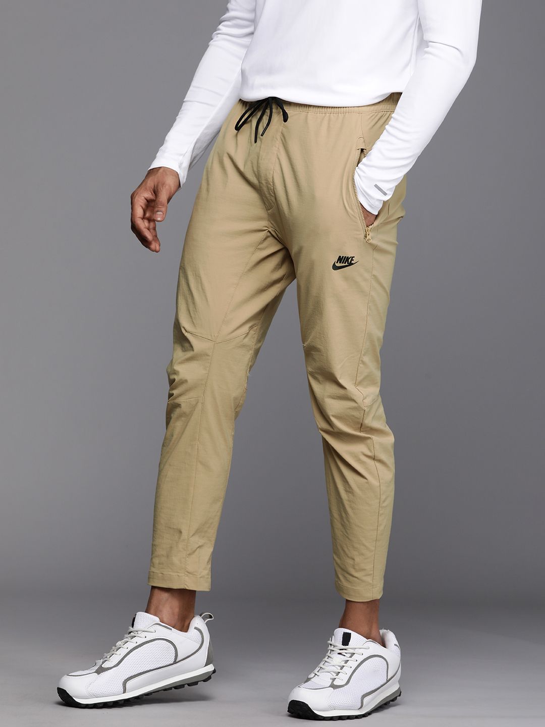  Nike Men Sportswear Solid Regular Fit Track Pants
