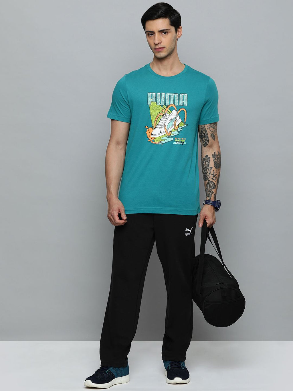  Puma Men Solid Mid Rise T7 Track Regular Fit Track Pants
