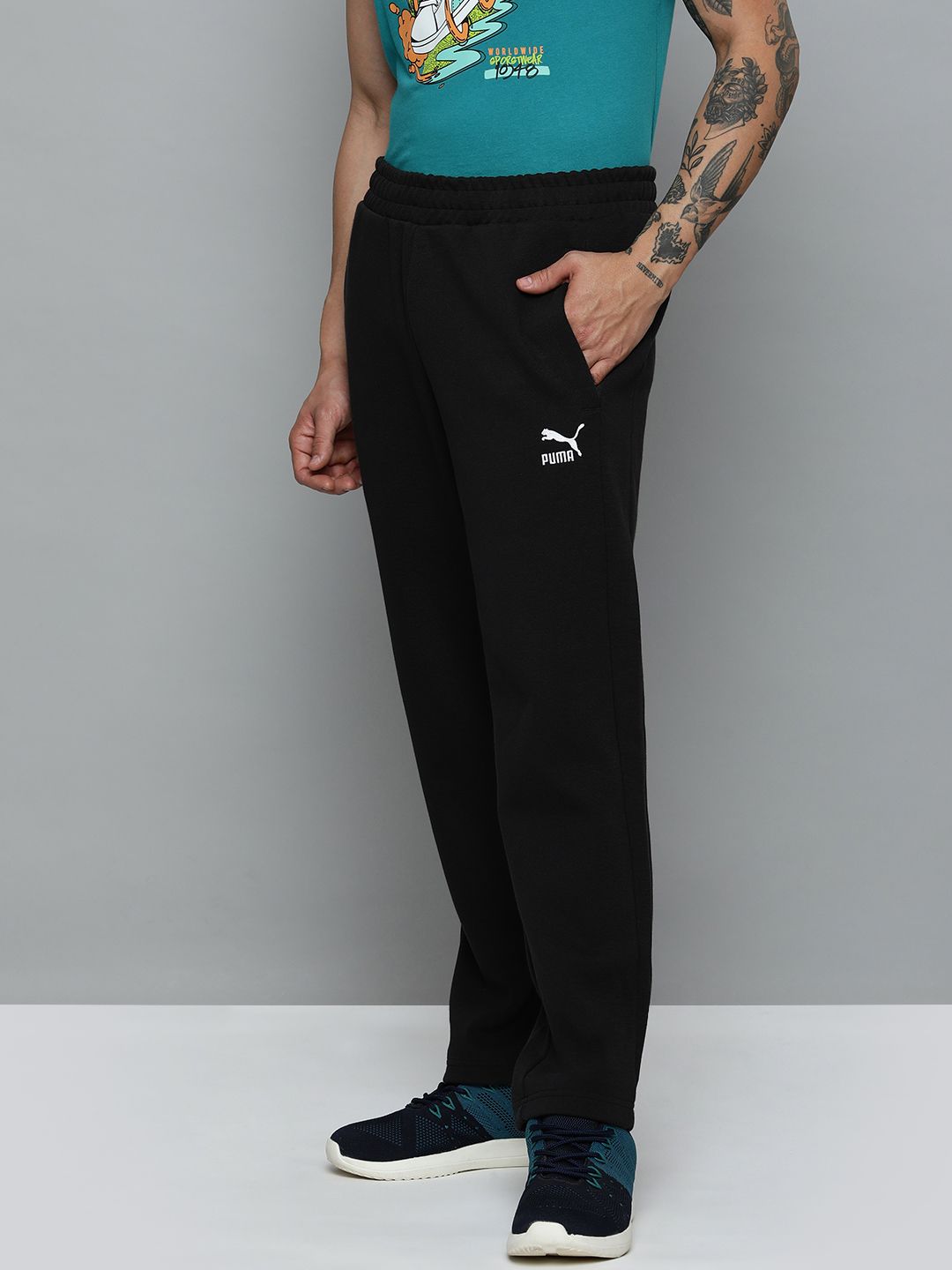  Puma Men Solid Mid Rise T7 Track Regular Fit Track Pants