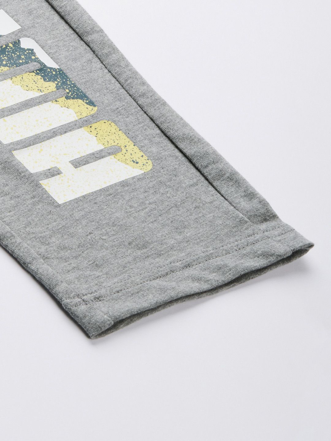  Puma Men Grey Melange Typography Printed Zippered Slim Fit Regular Track Pants