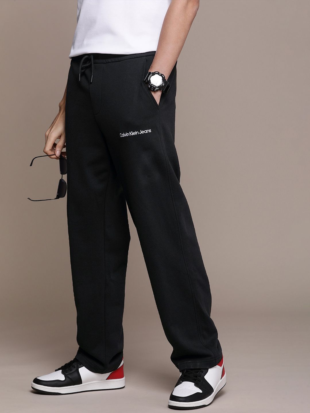 Calvin Klein Jeans Men Mid-Rise Pure Cotton Track Pants With Typography Embroidered Detail