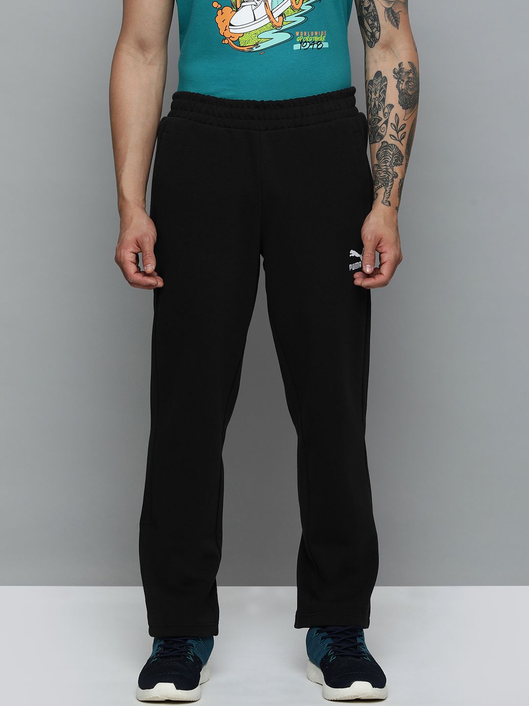  Puma Men Solid Mid Rise T7 Track Regular Fit Track Pants
