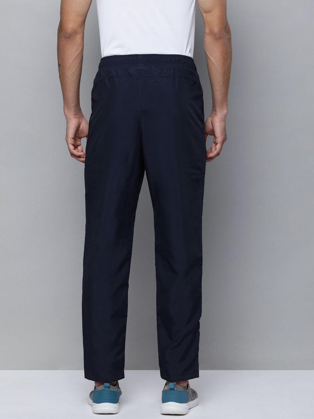  Puma Men Solid Mid Rise Woven Regular Fit Track Pants