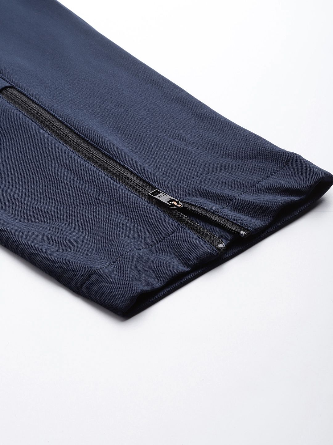  Reebok Men Navy Blue Solid Training WOR Knit Track Pants