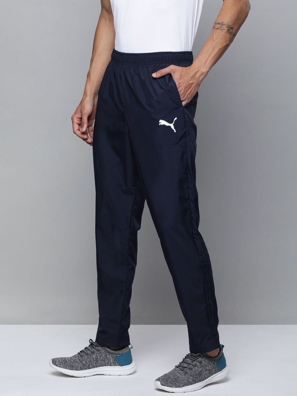  Puma Men Solid Mid Rise Woven Regular Fit Track Pants