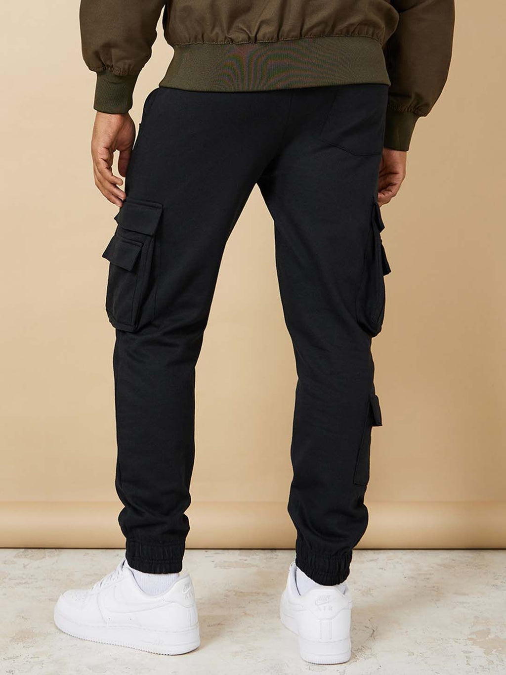  Styli Men Solid Relaxed Fit Cotton Joggers With Zipper Pockets