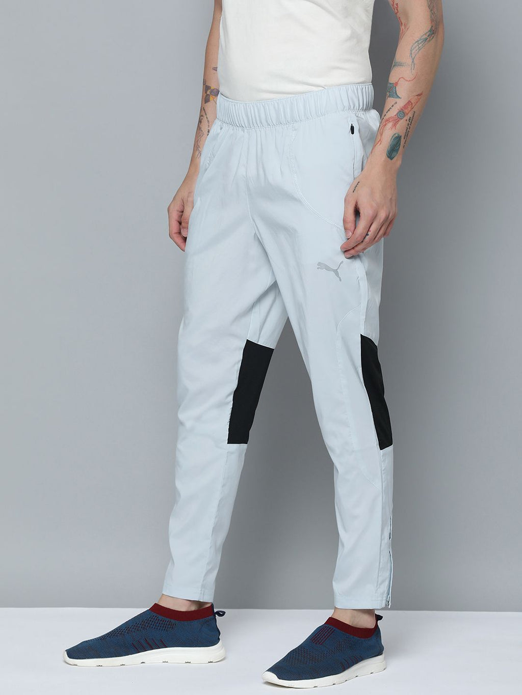  Puma Men Tapered Fit Woven Colourblocked Mid-Rise DryCELL Running Trackpants