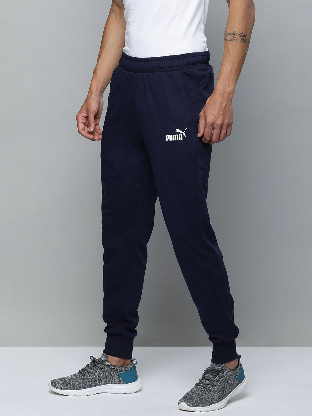  Puma Men Solid Mid Rise Joggers