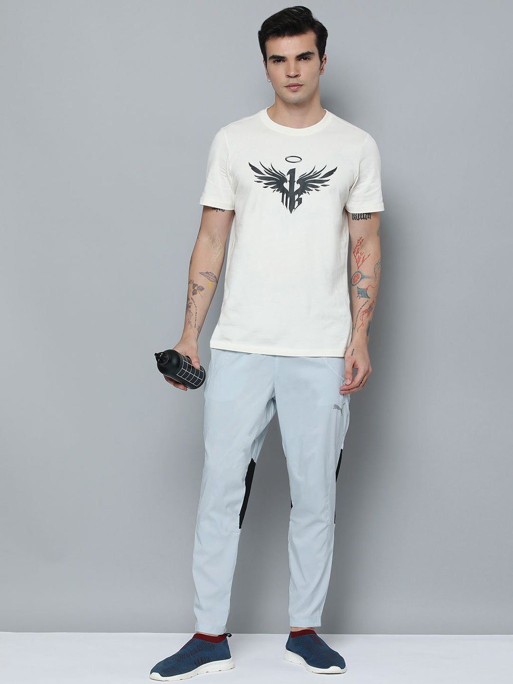  Puma Men Tapered Fit Woven Colourblocked Mid-Rise DryCELL Running Trackpants