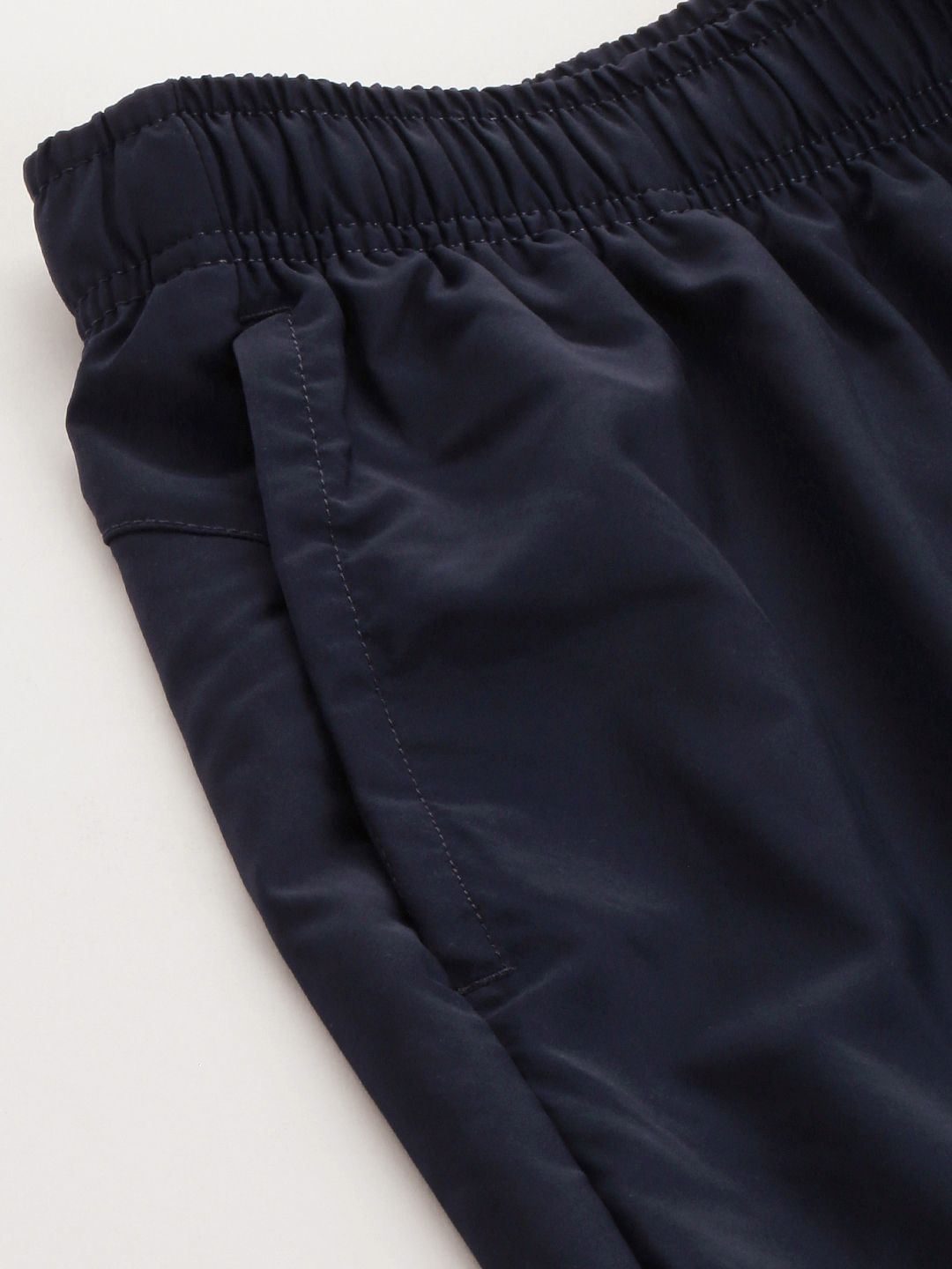  Puma Men Solid Mid Rise Woven Regular Fit Track Pants