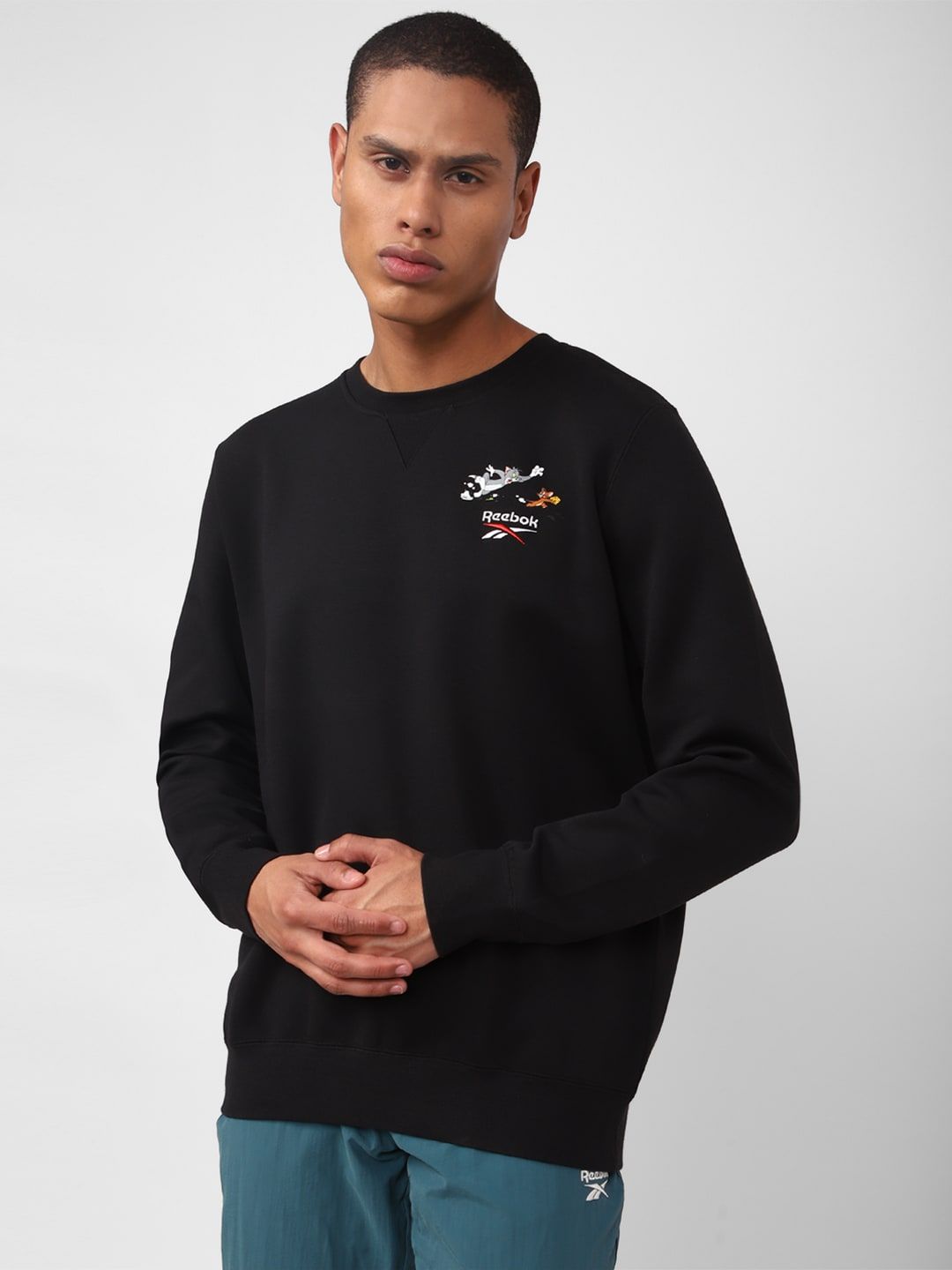  Reebok Men Tom And Jerry Printed Classic Pullover Sweatshirt