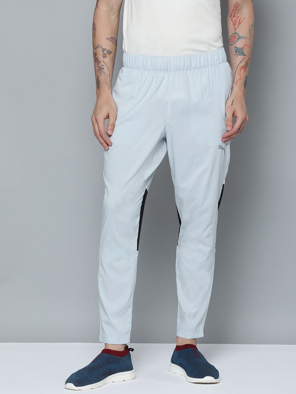  Puma Men Tapered Fit Woven Colourblocked Mid-Rise DryCELL Running Trackpants