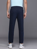  Nike Men Navy Blue Solid Standard FitMid Rise AS M NK DF EPIC KNIT Track Pants
