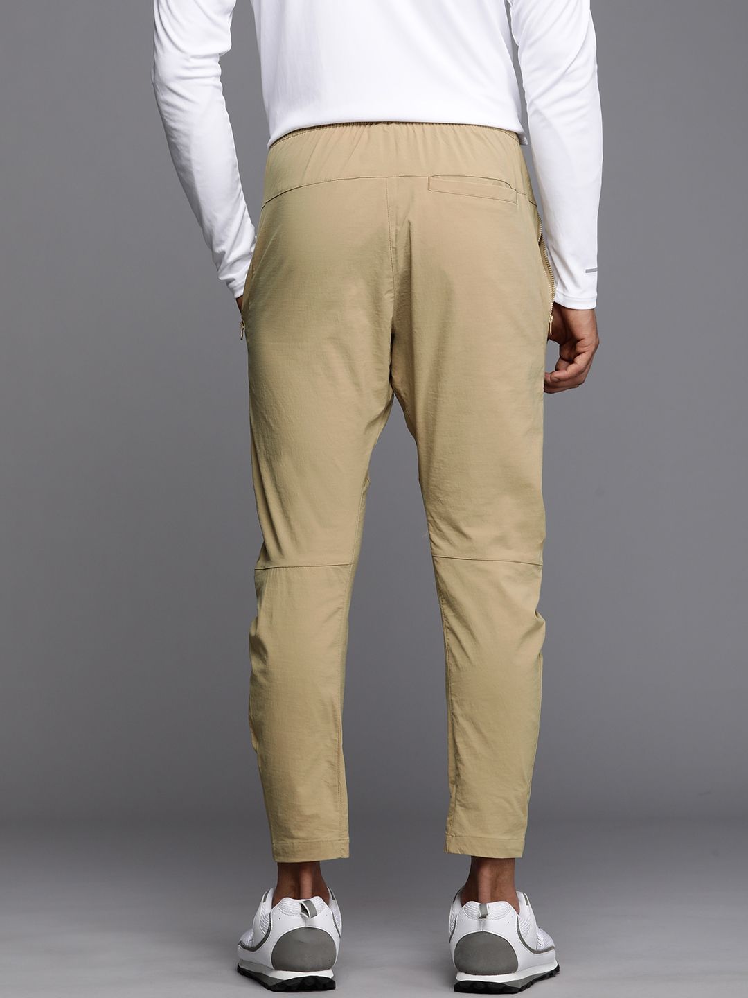  Nike Men Sportswear Solid Regular Fit Track Pants