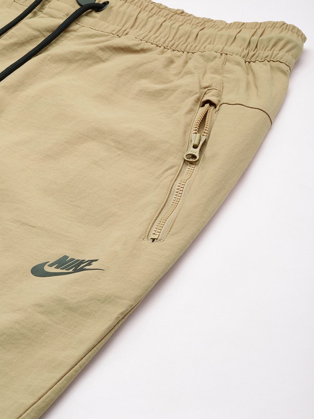 Nike Men Sportswear Solid Regular Fit Track Pants