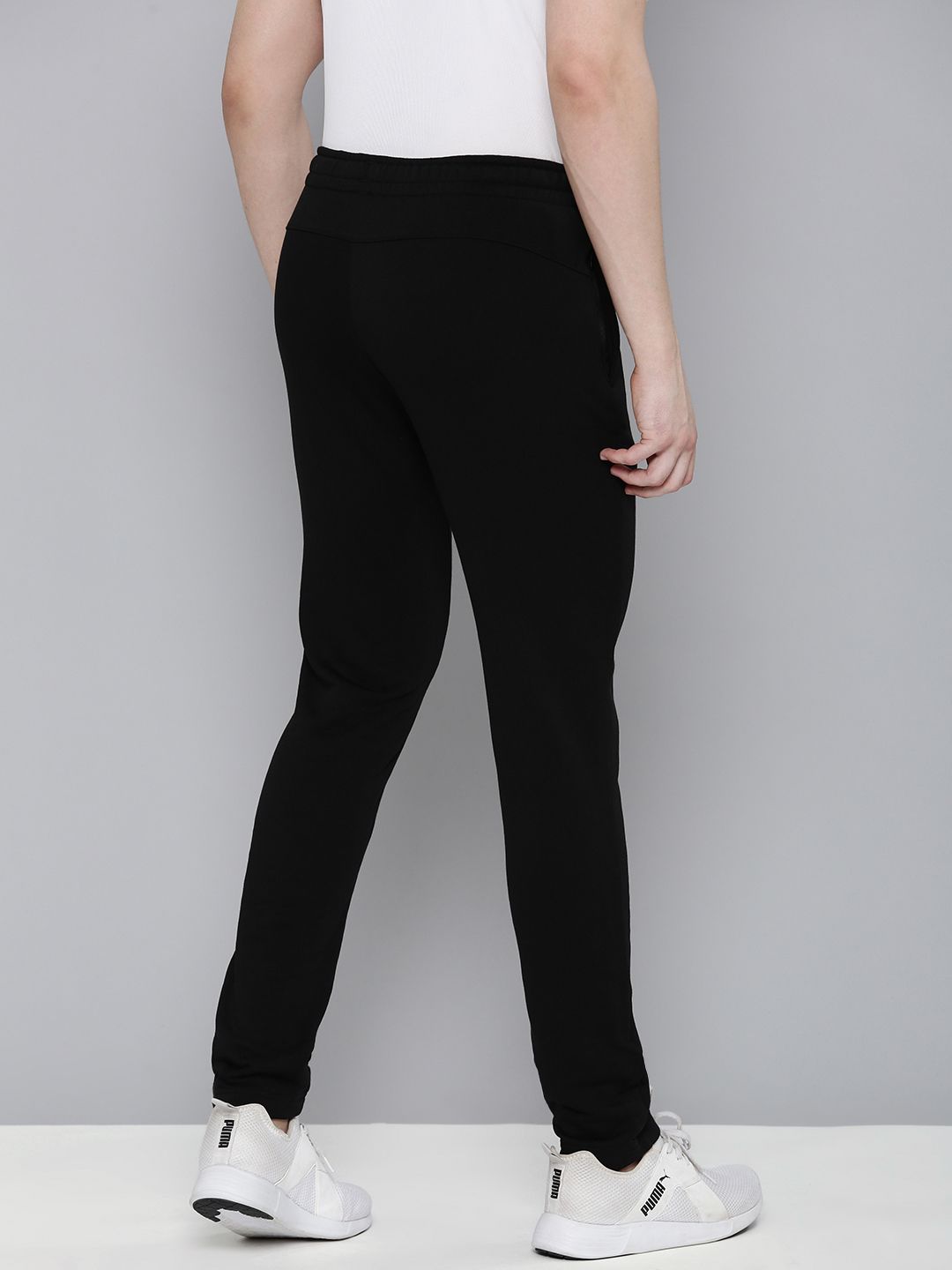  Puma Men Solid Slim Fit Zippered Knitted Track Pants