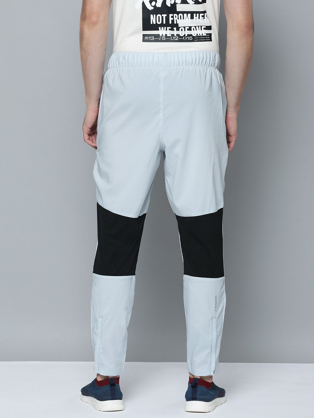  Puma Men Tapered Fit Woven Colourblocked Mid-Rise DryCELL Running Trackpants