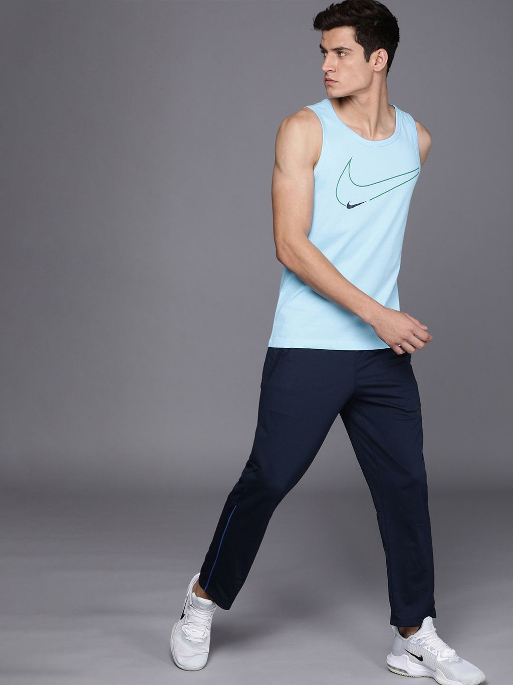  Nike Men Navy Blue Solid Standard FitMid Rise AS M NK DF EPIC KNIT Track Pants