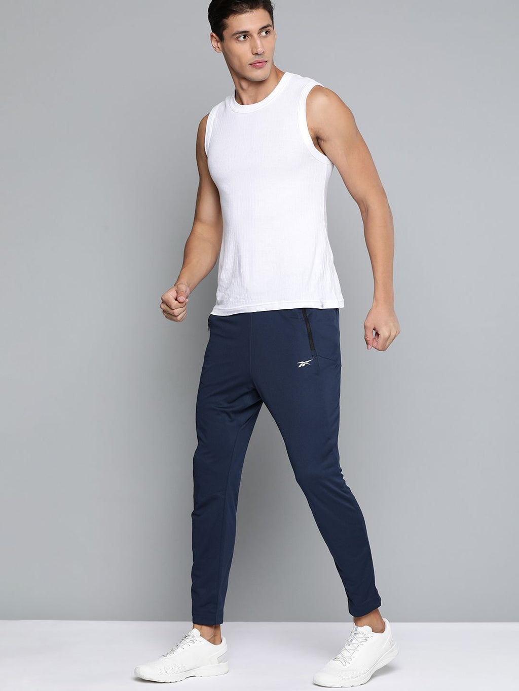 Reebok Men Navy Blue Solid Training WOR Knit Track Pants