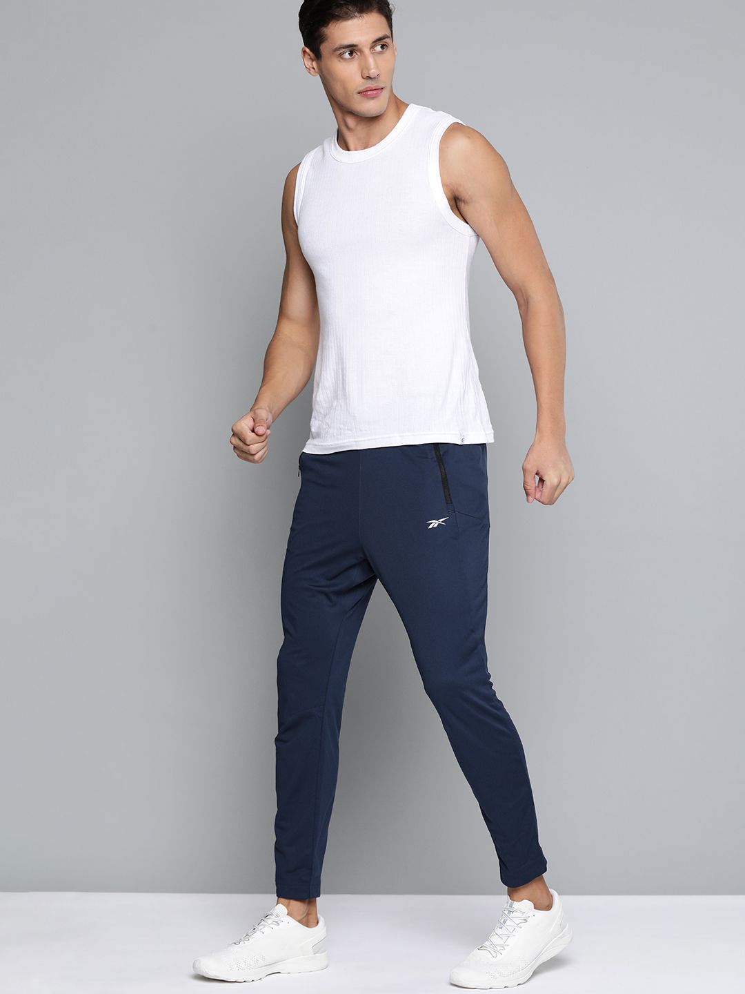 Reebok Men Navy Blue Solid Training WOR Knit Track Pants