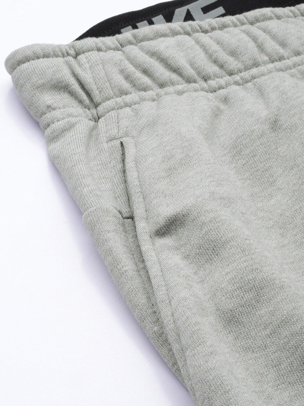 Nike Men Grey Solid Dri-FIT M NK Tapered Fit Training Joggers With Printed Detailing