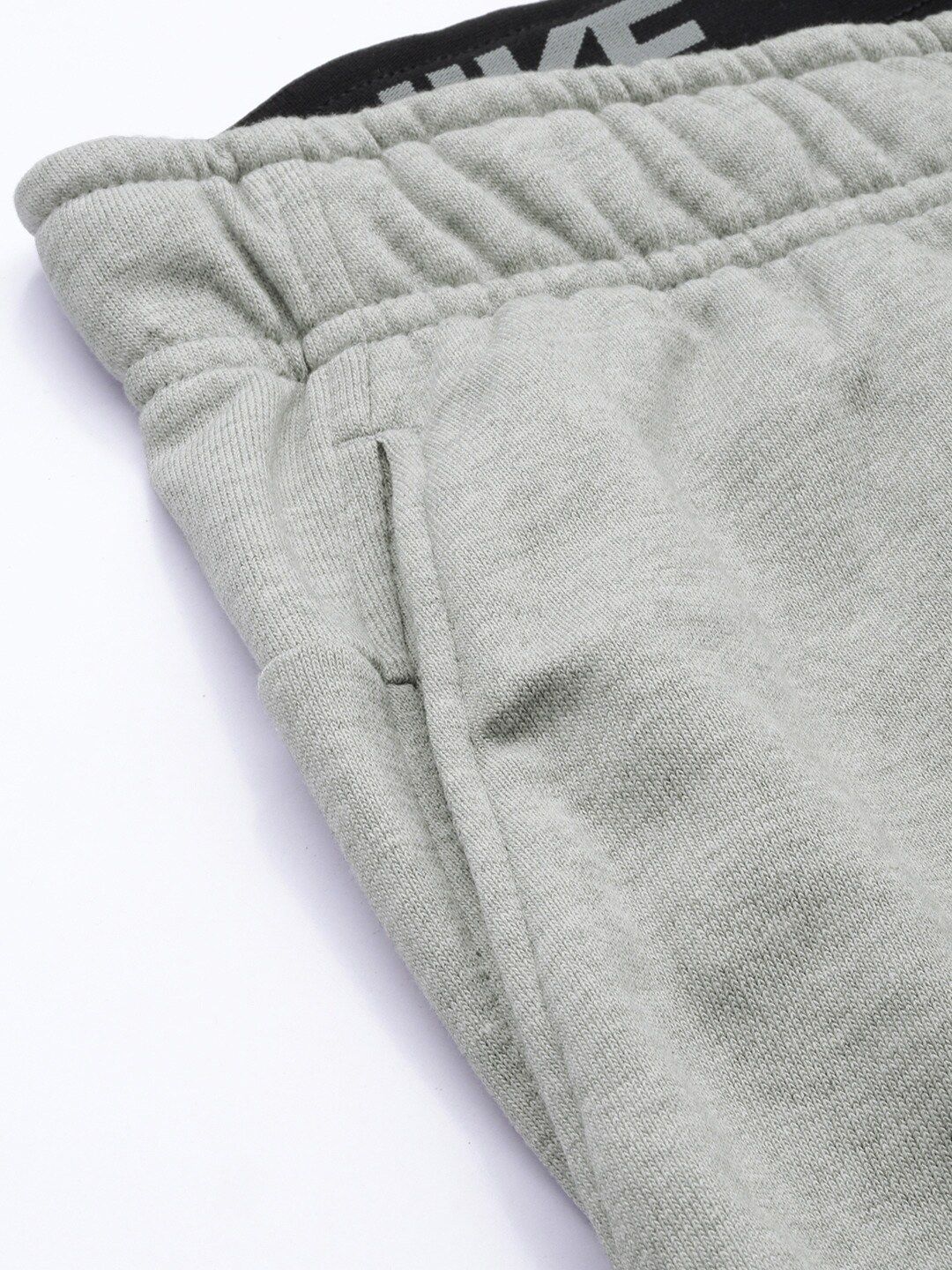  Nike Men Grey Solid Dri-FIT M NK Tapered Fit Training Joggers With Printed Detailing