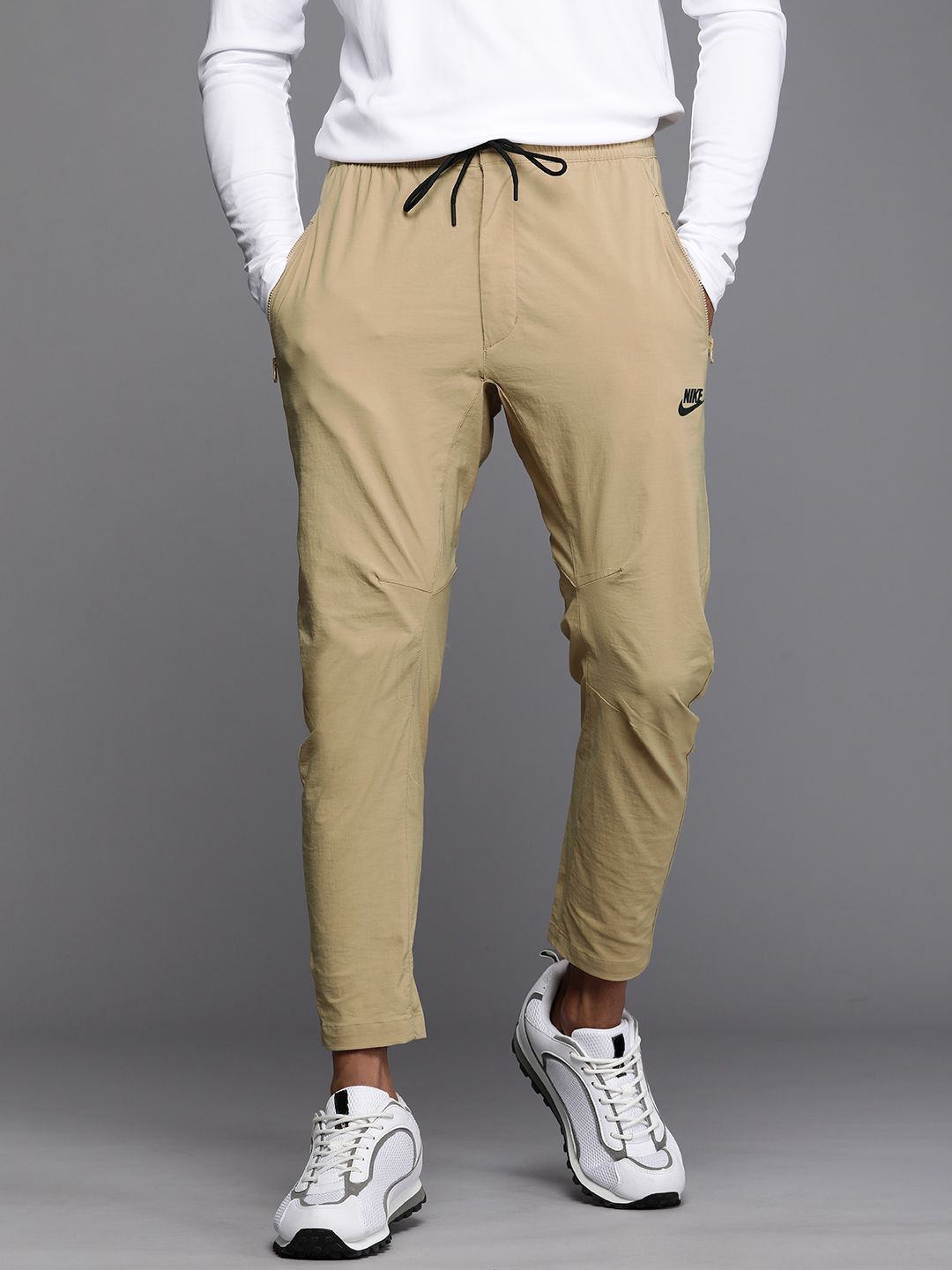  Nike Men Sportswear Solid Regular Fit Track Pants