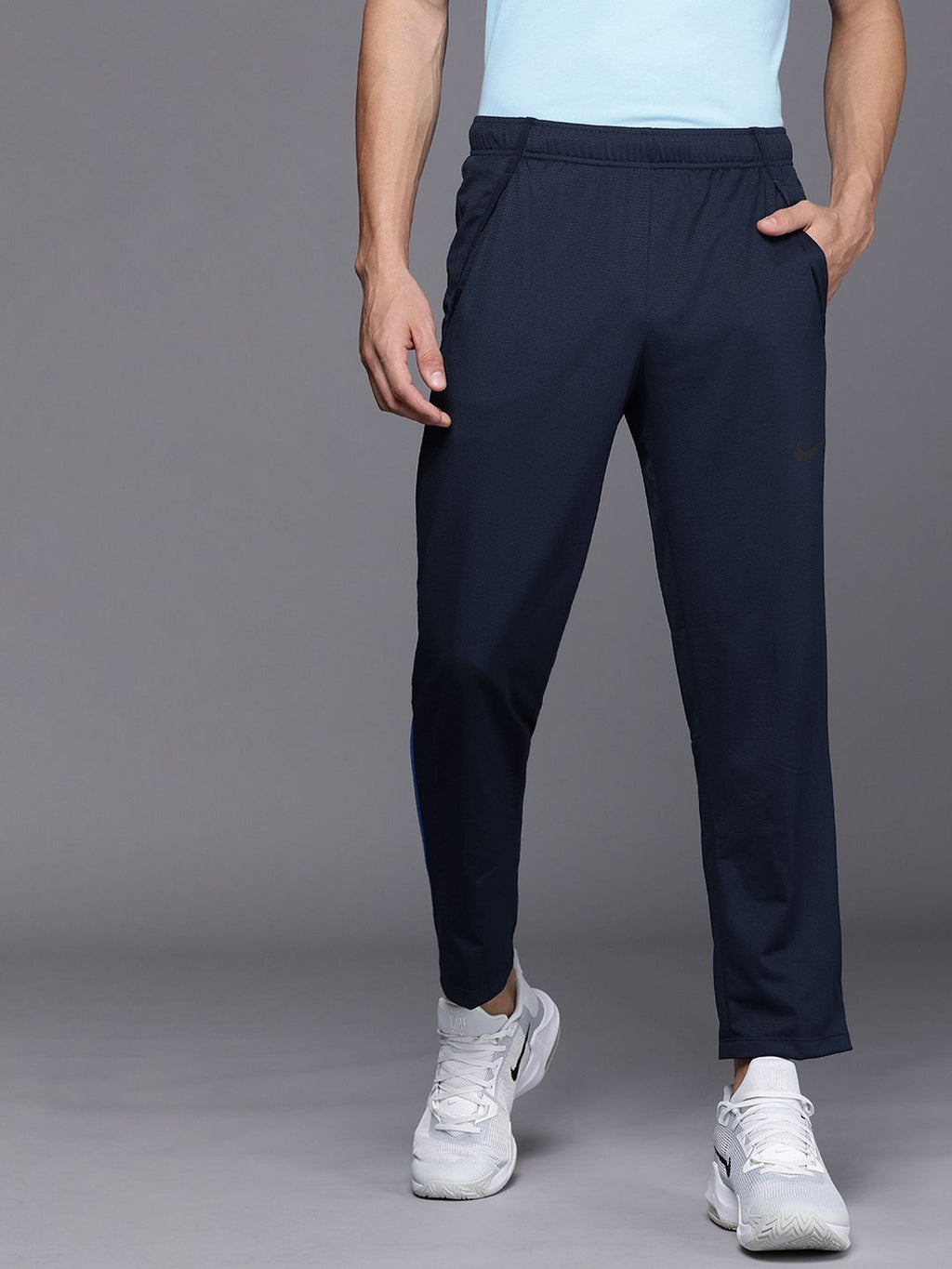 Nike Men Navy Blue Solid Standard FitMid Rise AS M NK DF EPIC KNIT Track Pants