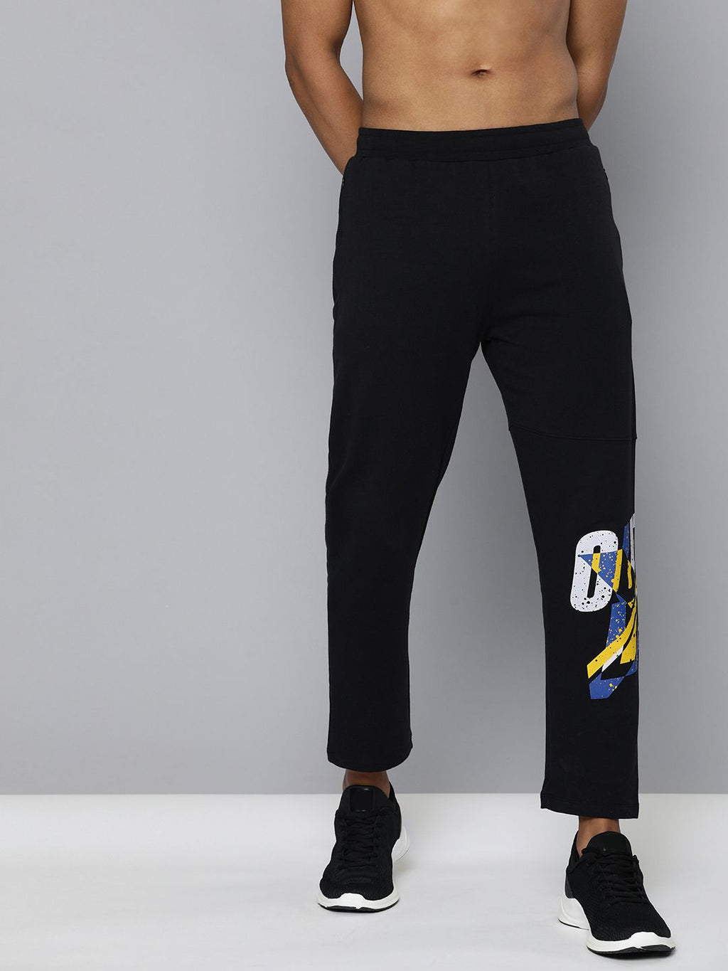  HRX By Hrithik Roshan Men Jet Black Solid Slim Fit Lycra Bio-Wash Gold Finish Lifestyle Track Pants