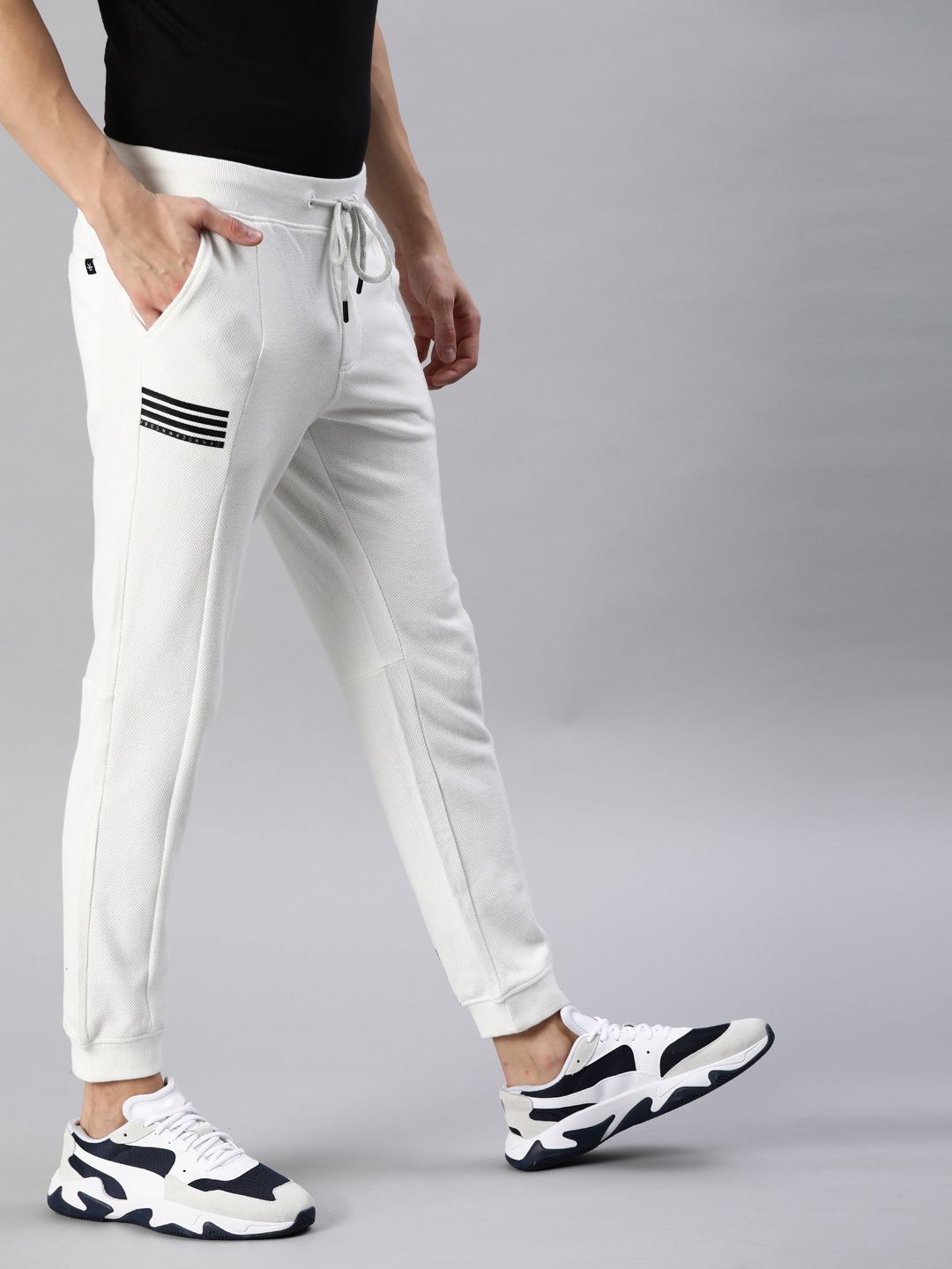  WROGN Men White Solid Slim Fit Joggers With Printed Detailing