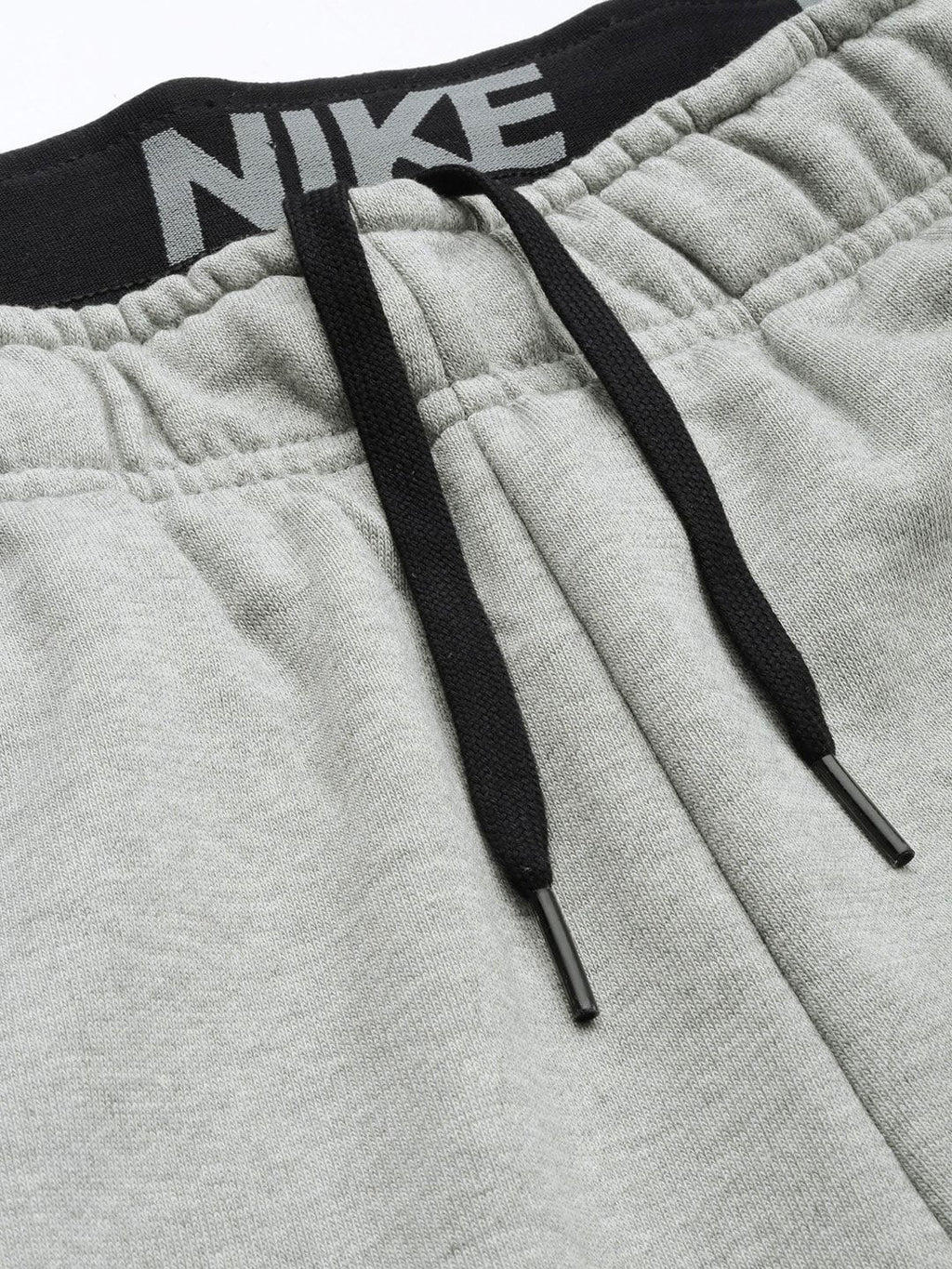  Nike Men Grey Solid Dri-FIT M NK Tapered Fit Training Joggers With Printed Detailing