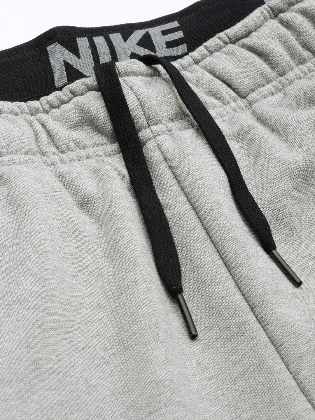  Nike Men Grey Solid Dri-FIT M NK Tapered Fit Training Joggers With Printed Detailing