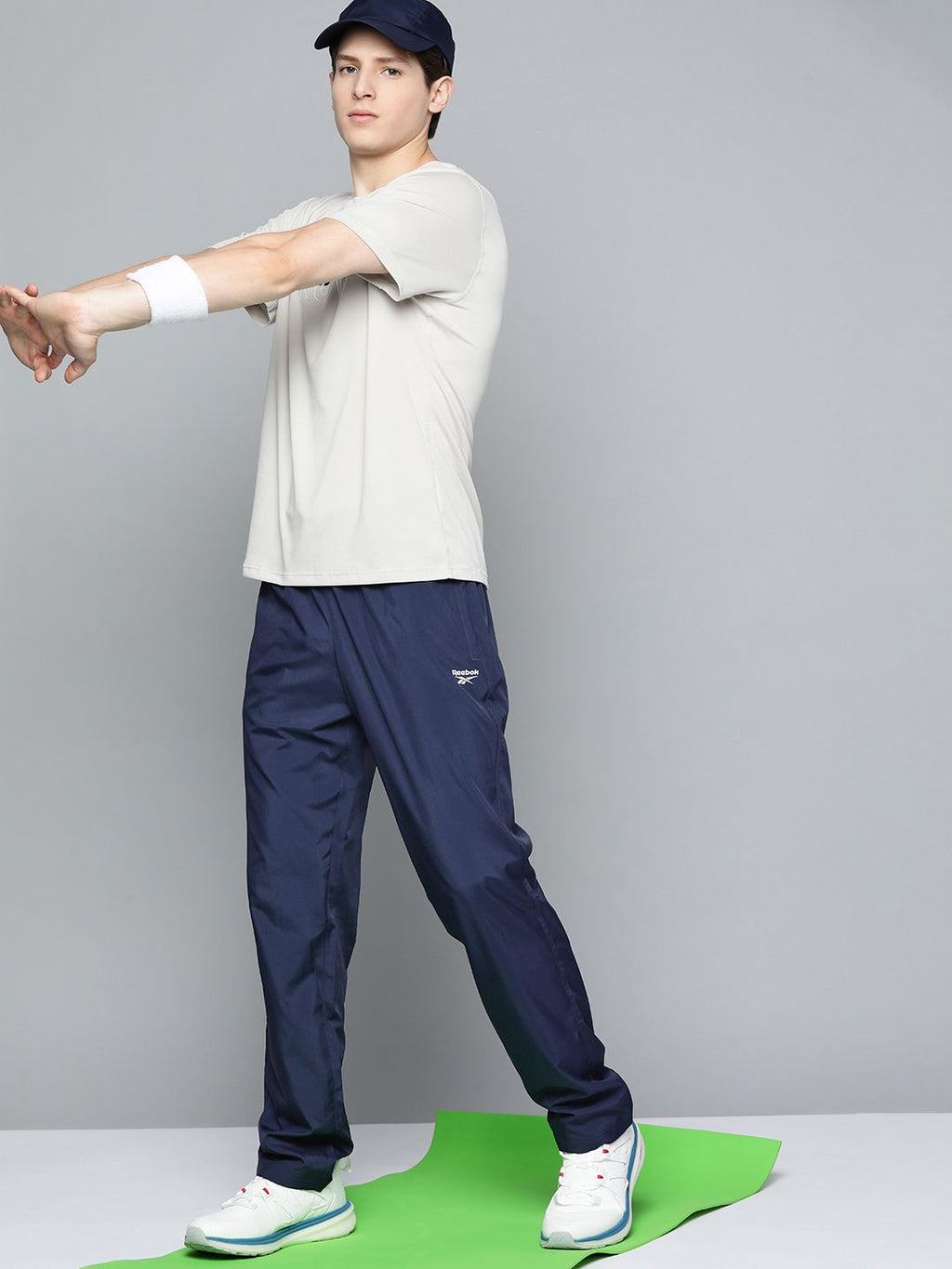  Reebok Men Navy Blue Solid TE WVN OH Training Track Pants