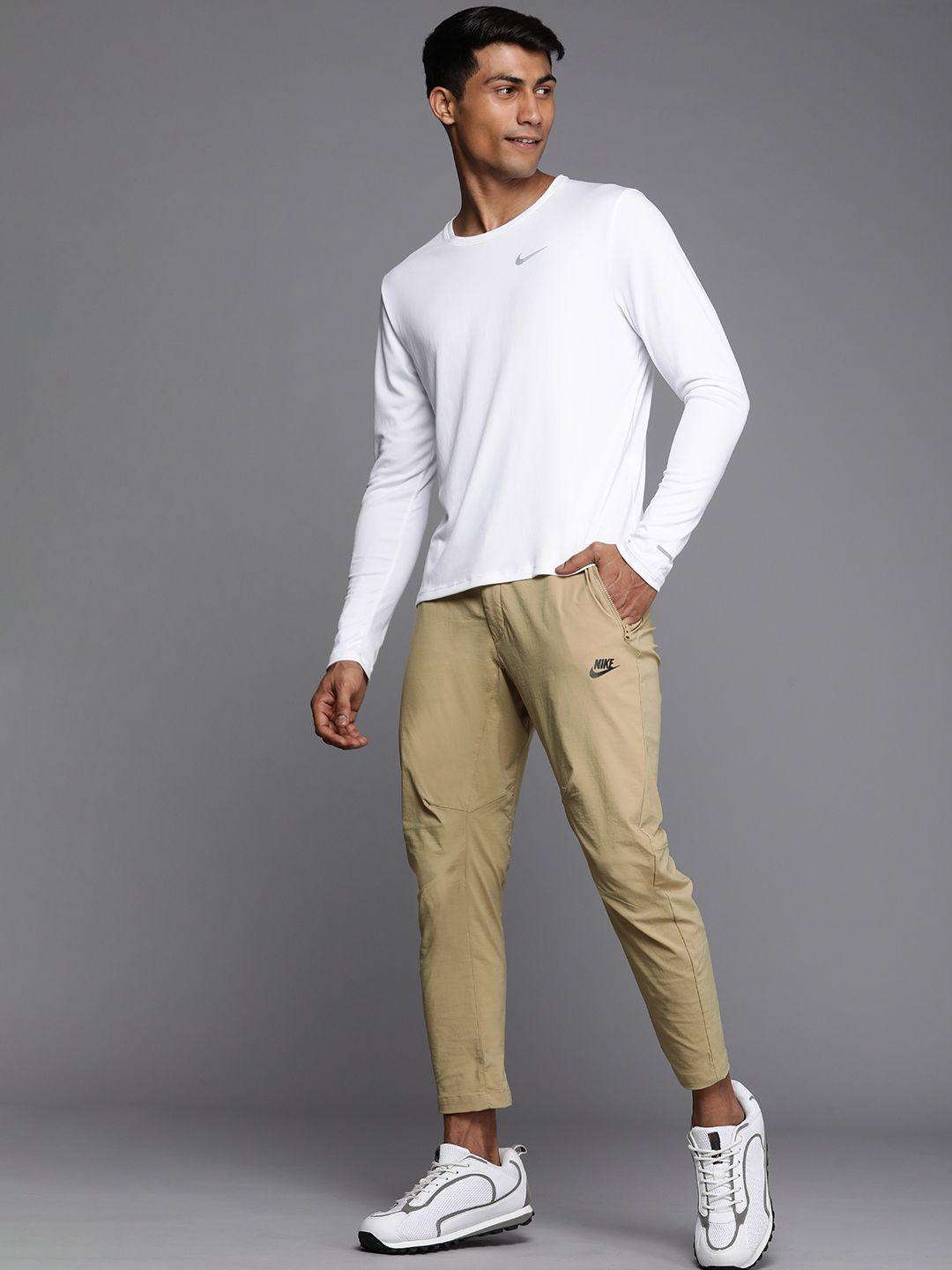  Nike Men Sportswear Solid Regular Fit Track Pants