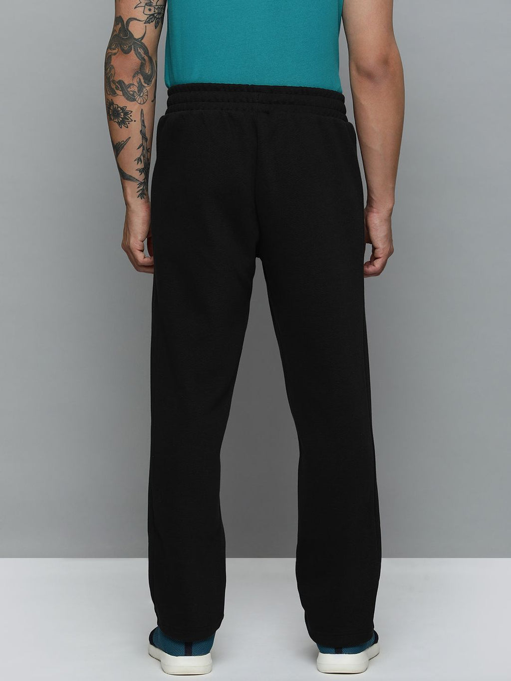  Puma Men Solid Mid Rise T7 Track Regular Fit Track Pants