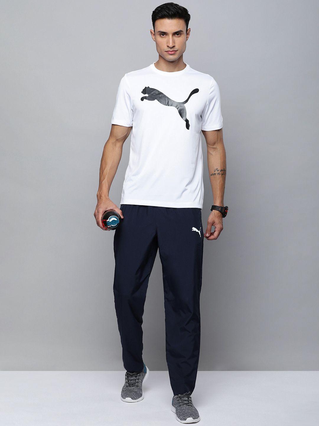  Puma Men Solid Mid Rise Woven Regular Fit Track Pants