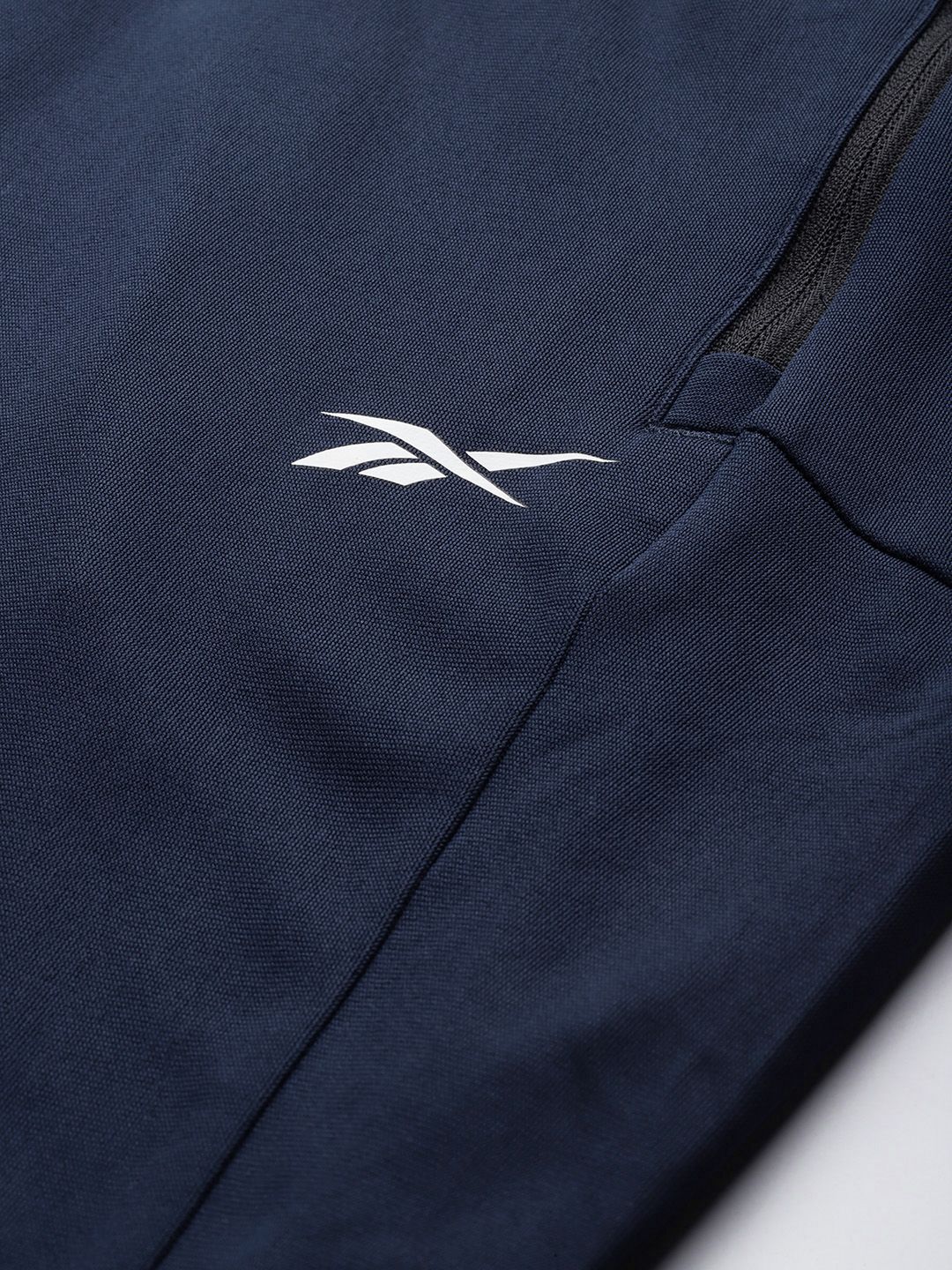  Reebok Men Navy Blue Solid Training WOR Knit Track Pants
