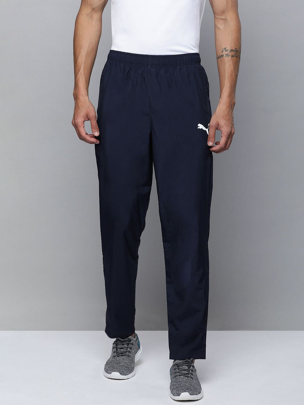  Puma Men Solid Mid Rise Woven Regular Fit Track Pants