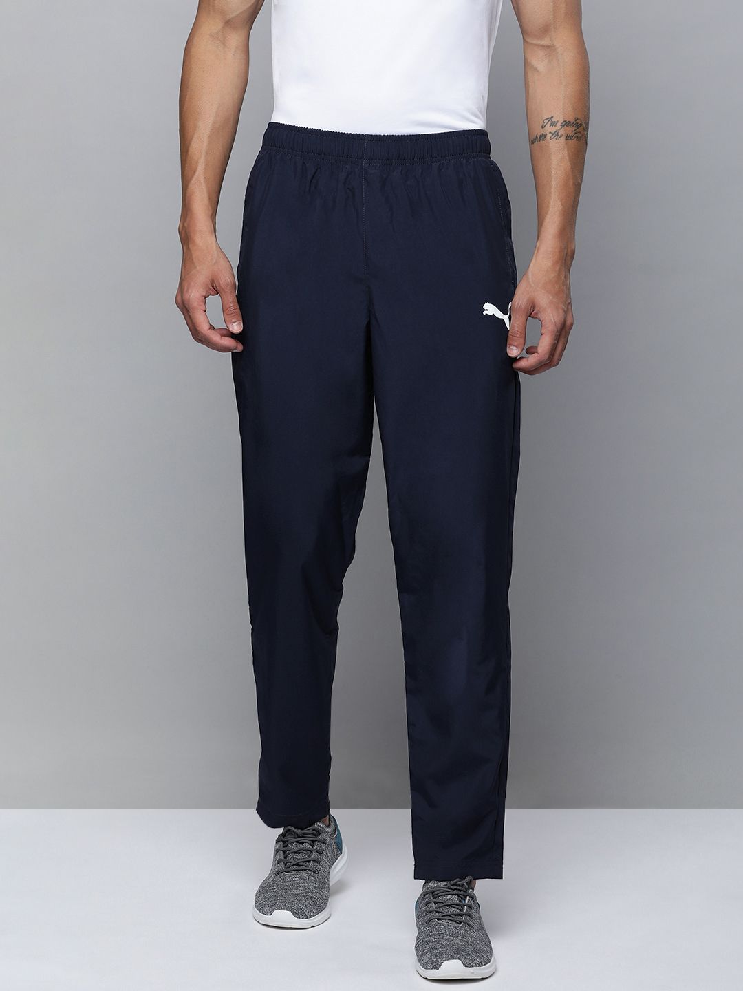  Puma Men Solid Mid Rise Woven Regular Fit Track Pants