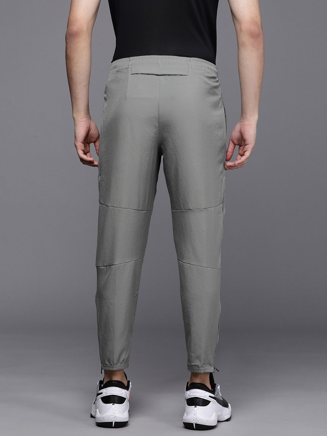  Nike Men Grey Tapered Fit Dri-FIT Challenger Woven Sustainable Running Track Pants
