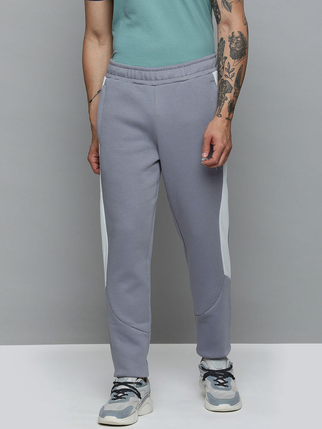 Puma Men Evo Stripe Knitted Dry-Cell Lightweight Slim Fit Casual Pants